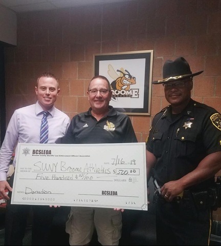 BC Sheriffs presented Athletics with check