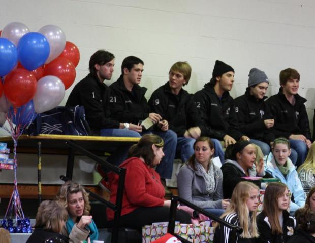 Ice Hockey Team Participates In Giving Of The Toys