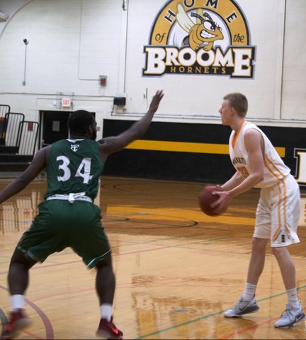 SUNY Broome player defended by opponent