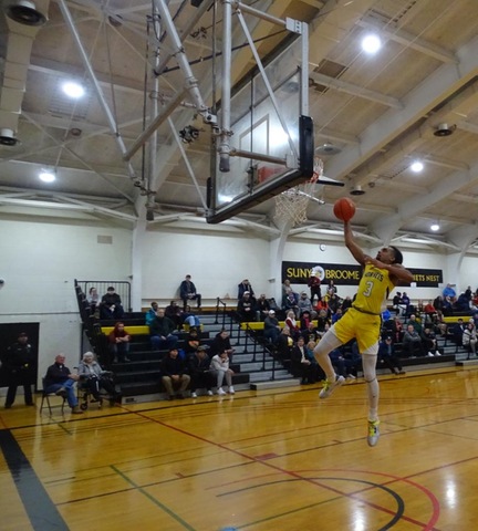 Broome player going up for a dunk