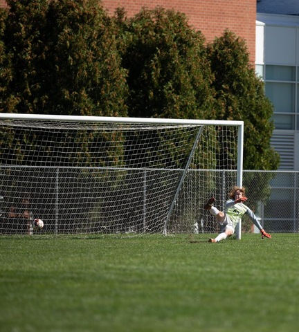 Ball going into net past Broome keeper