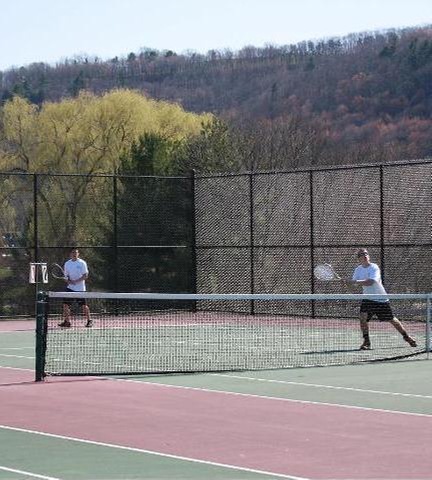 Broome players in doubles match