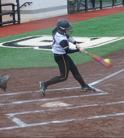 Player swinging at ball