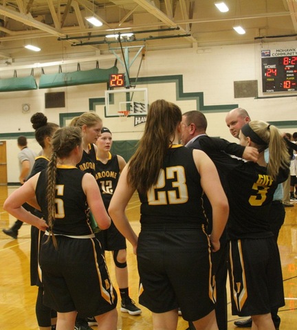 SUNY Broome women's basketball team during a timeout against Mohawk Valley