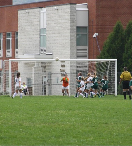 SUNY Broome goalkeeper getting ready to make save against Herkimer College