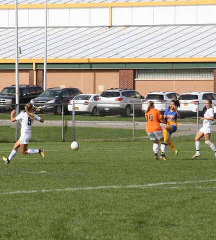SUNY Broome keeper coming out of goal for save