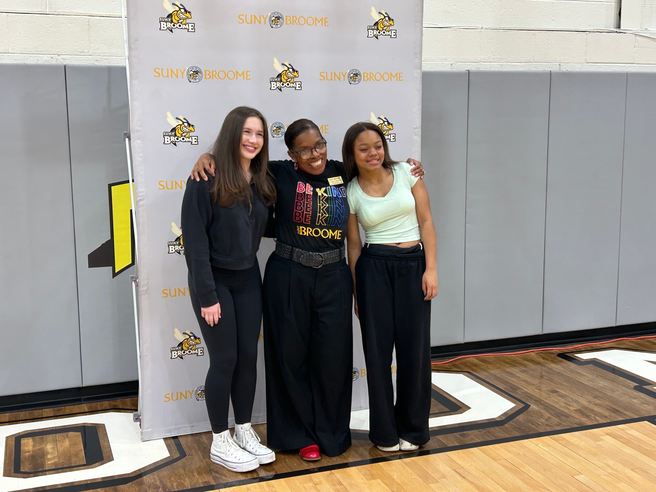 Picture of vice president with student-athlete recruits