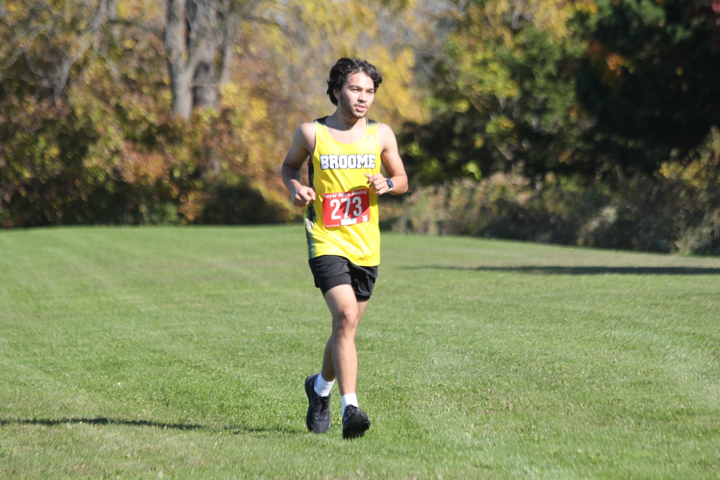 Broome cross country runner action photo