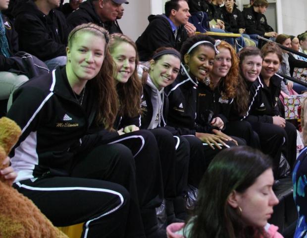 Women's Basketball Team Participates In Giving Of The Toys