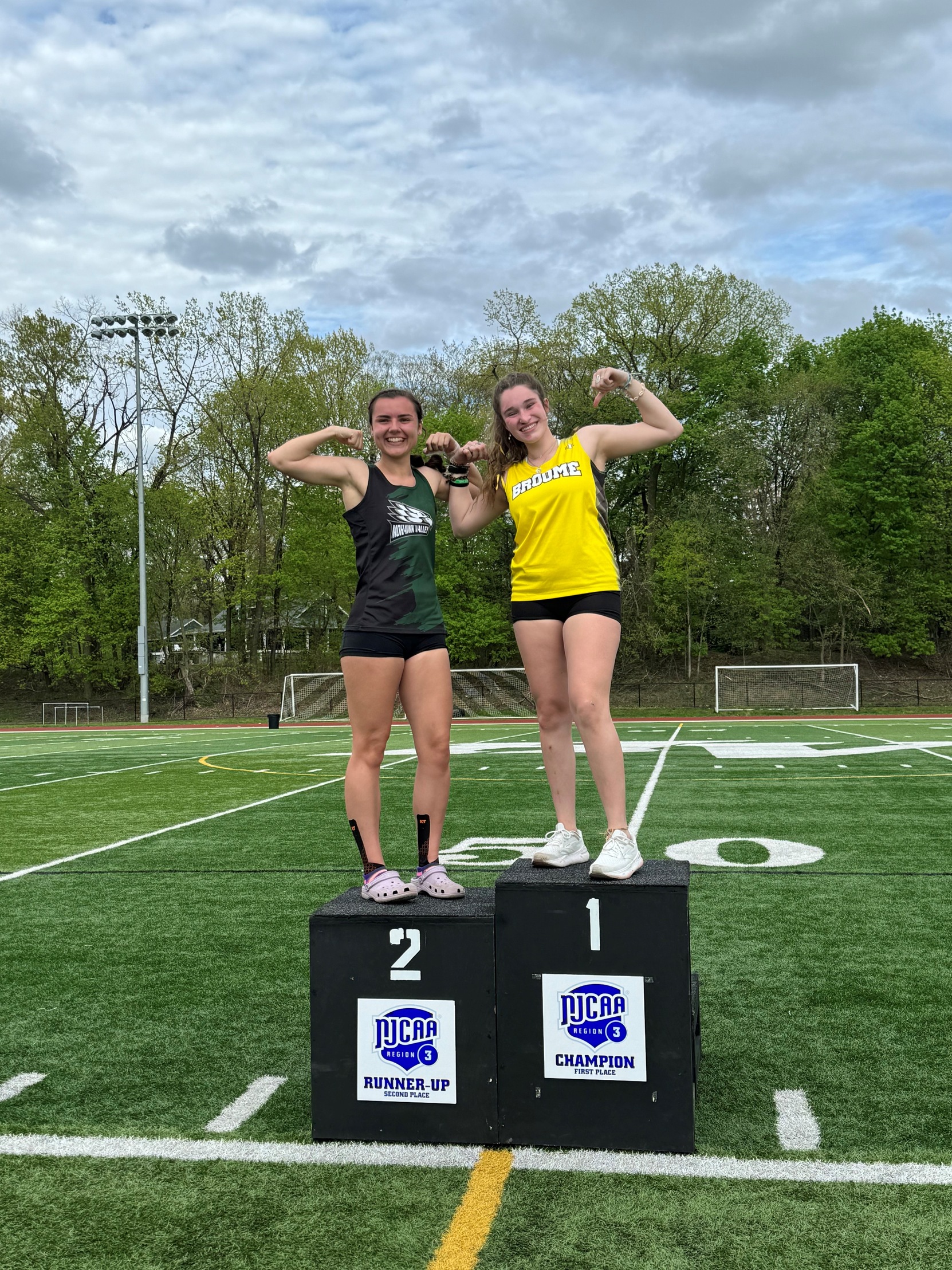 Broome athlete standing and posing on 1st place podium