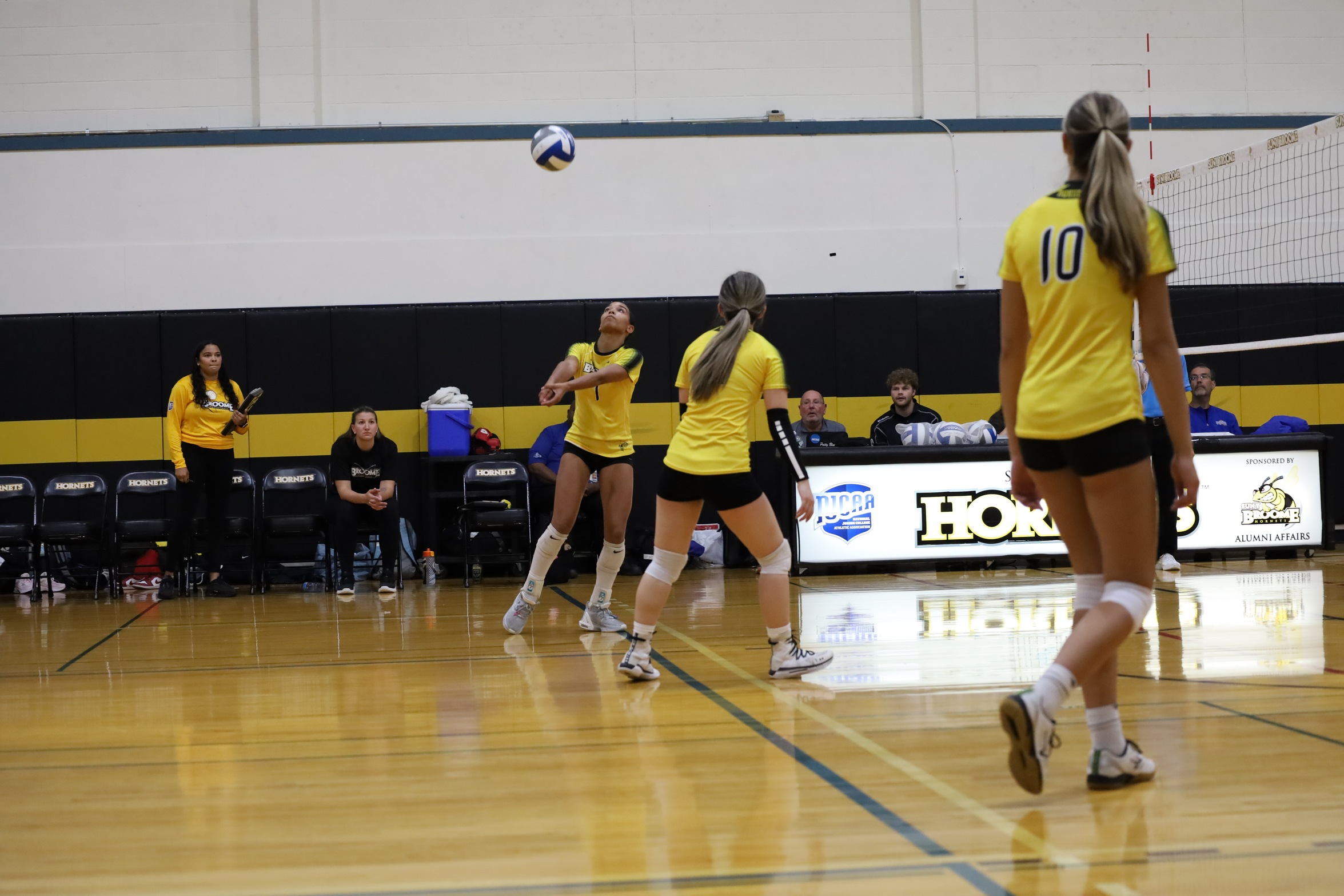 Broome volleyball player hitting ball